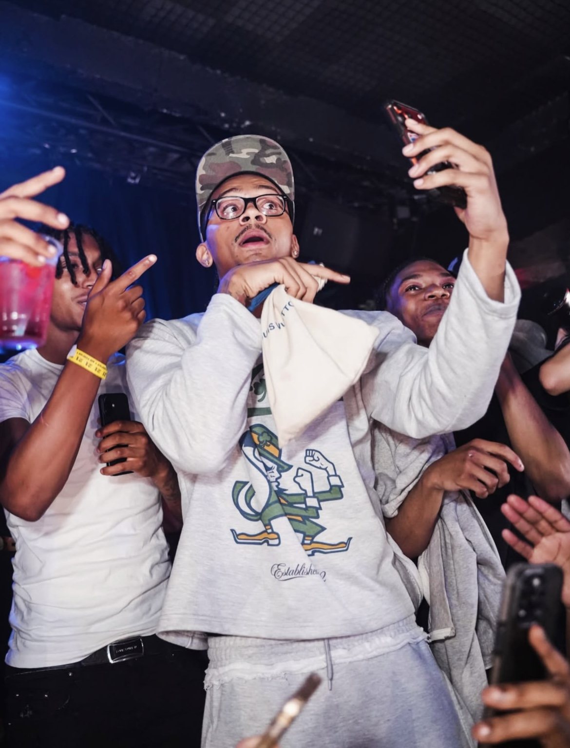 Guest taking a stage selfie at SiSi Presents